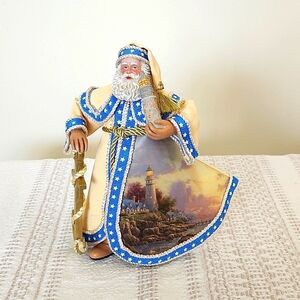 Thomas Kinkade 2004 lighthouse painting with anchor tabletop decor